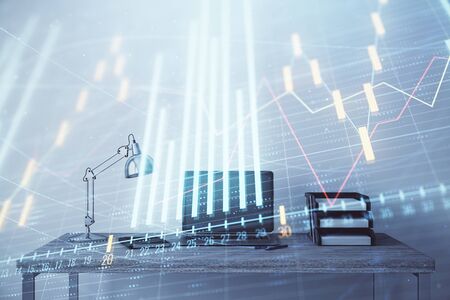 Stock market chart and desktop office computer background. Multi exposure. Concept of financial analysis.の写真素材