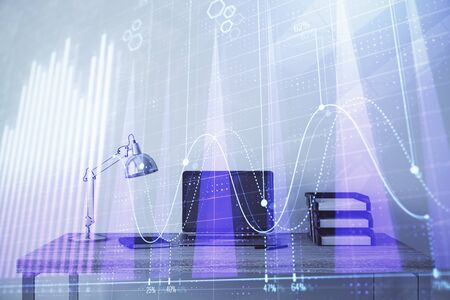 Stock market chart and desktop office computer background. Multi exposure. Concept of financial analysis.の写真素材