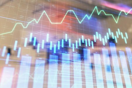 Stock market chart with trading desk bank office interior on background. Double exposure. Concept of financial analysisの写真素材