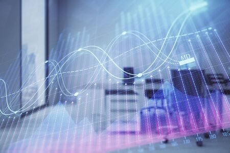 Stock market chart with trading desk bank office interior on background. Double exposure. Concept of financial analysisの写真素材