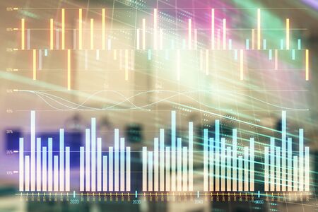 Stock market chart with trading desk bank office interior on background. Double exposure. Concept of financial analysisの写真素材