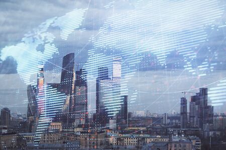 Double exposure of world map on city veiw background. Concept of international tradingの写真素材