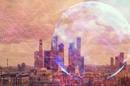 Double exposure of world map on city veiw background. Concept of international tradingの写真素材