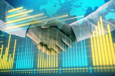 Multi exposure of forex graph and world map on abstract background with two businessmen handshake. Concept of success on international marketsの写真素材