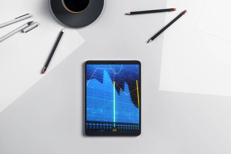 Digital tablet closeup top view with financial graph on screen. Online trading application concept. 3d rendering.の写真素材