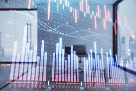 Forex chart hologram with minimalistic cabinet interior background. Double exposure. Stock market concept.の写真素材