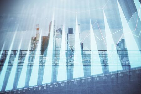 Forex graph hologram with city view from roof background. Double exposure. Stock market concept.の写真素材