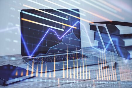 Stock market chart and desktop office computer background. Multi exposure. Concept of financial analysis.の写真素材