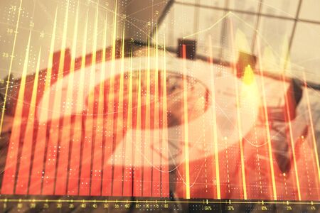 Multi exposure of stock market graph on conference room background. Concept of financial analysisの写真素材