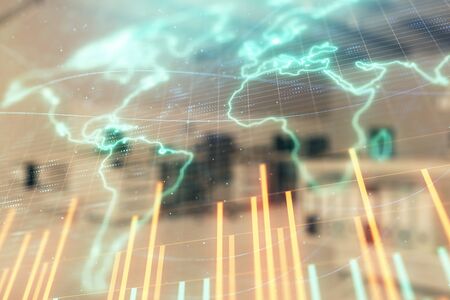 Stock and bond market graph and world map with trading desk bank office interior on background. Multi exposure. Concept of international financeの写真素材