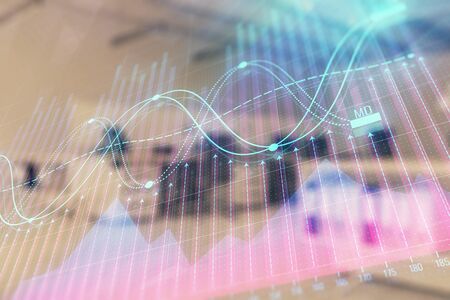 Stock market chart with trading desk bank office interior on background. Double exposure. Concept of financial analysisの写真素材