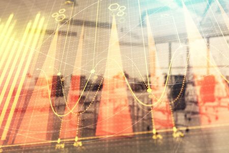 Stock and bond market graph with trading desk bank office interior on background. Multi exposure. Concept of financial analysisの写真素材
