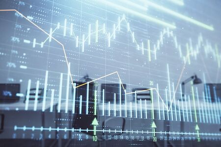 Stock and bond market graph with trading desk bank office interior on background. Multi exposure. Concept of financial analysisの写真素材