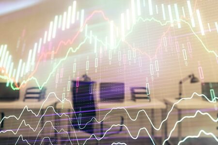 Stock and bond market graph with trading desk bank office interior on background. Multi exposure. Concept of financial analysisの写真素材