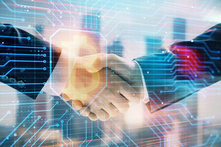 Double exposure of crypto economy theme drawing on cityscape background with handshake. Concept of partnership and blockchainの写真素材