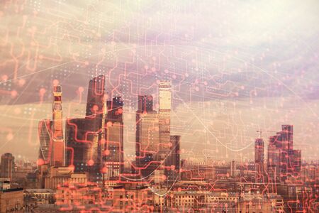 Double exposure of abstract technology drawing on cityscape background. Concept of tech innovationの写真素材