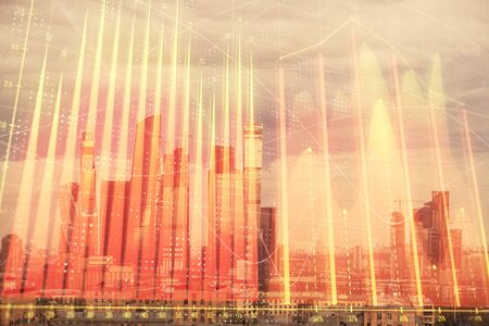 Double exposure of financial graph on downtown veiw background. Concept of stock market research and analysisの写真素材