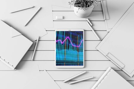 Digital tablet closeup top view with financial graph on screen. Online trading application concept. 3d rendering.の写真素材