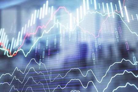 Stock and bond market graph with trading desk bank office interior on background. Multi exposure. Concept of financial analysisの写真素材
