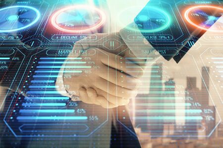 Double exposure of business theme drawing on cityscape background with handshake. Concept of partnershipの写真素材