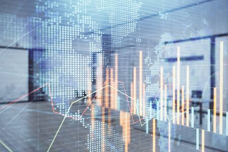 Stock and bond market graph and world map with trading desk bank office interior on background. Multi exposure. Concept of international financeの写真素材