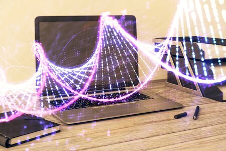 DNA hologram with desktop office background. Double exposure. Concept of educationの写真素材