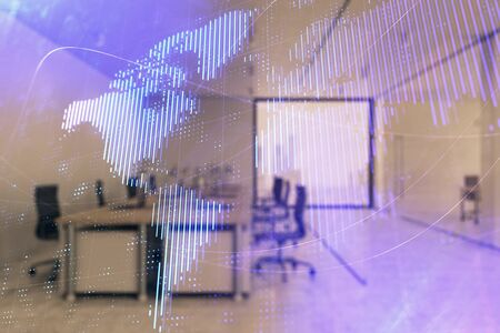 World map with trading desk bank office interior on background. Multi exposure. Concept of international financeの写真素材