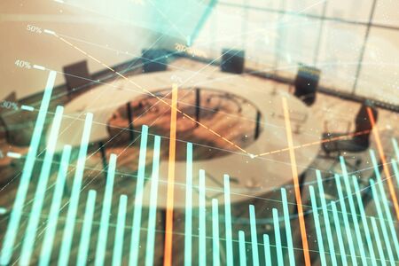 Multi exposure of stock market graph on conference room background. Concept of financial analysisの写真素材