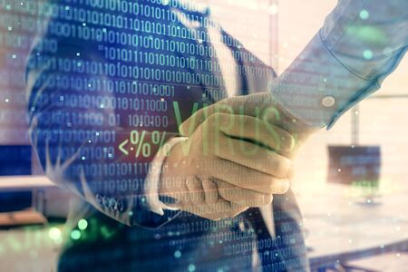 Double exposure of hacking theme hologram on office background with two men handshake. Concept of...