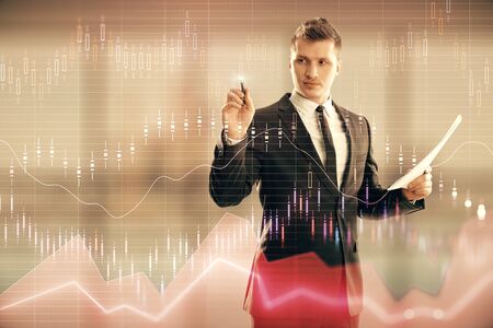 Businessman and forex graph hologram. Double exposure. Concept of financial education and analysis