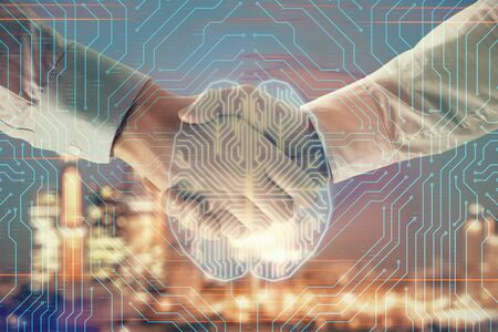 Multi exposure of human brain drawing on city view background with handshake. Concept of brainstorm
