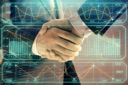Multi exposure of forex graph on abstract background with two businessmen handshake. Concept of...