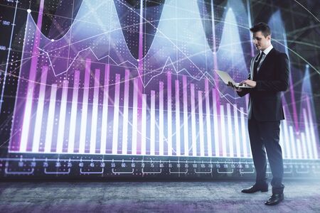 Businessman and forex graph hologram. Double exposure. Concept of financial education and analysisの写真素材