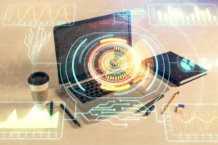 Technology theme hologram and desktop office computer background. Double exposure. Concept of high technologyの写真素材