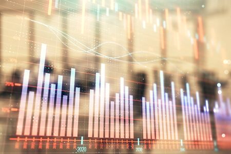 Stock and bond market graph with trading desk bank office interior on background. Multi exposure. Concept of financial analysisの写真素材