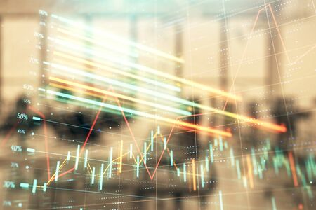 Stock and bond market graph with trading desk bank office interior on background. Multi exposure. Concept of financial analysisの写真素材