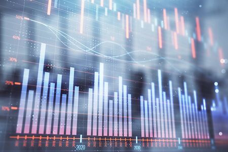 Stock and bond market graph with trading desk bank office interior on background. Multi exposure. Concept of financial analysisの写真素材