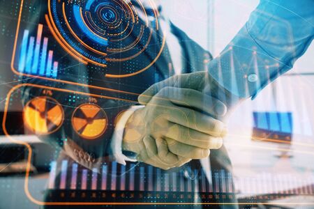 Double exposure of business theme drawing on office background with two businessmen handshake....