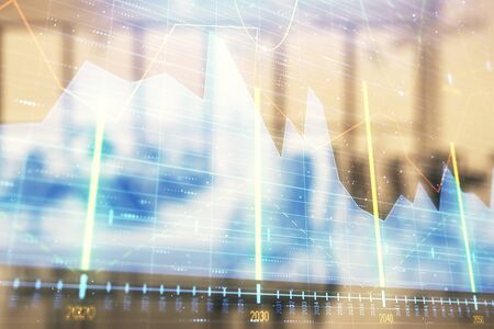 Stock and bond market graph with trading desk bank office interior on background. Multi exposure. Concept of financial analysisの写真素材