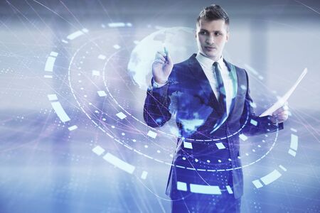 Businessman and world map hologram. Double exposure. Concept of international financeの写真素材