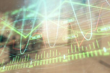 Stock market chart with trading desk bank office interior on background. Double exposure. Concept of financial analysisの写真素材