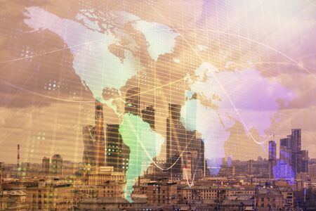 Double exposure of world map on city veiw background. Concept of international tradingの写真素材