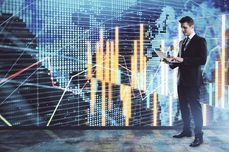 Businessman and forex graph and world map hologram. Double exposure. Concept of financial education and analysisの写真素材