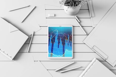 Digital tablet closeup top view with financial graph on screen. Online trading application concept. 3d rendering.の写真素材