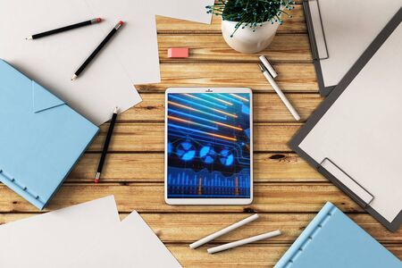 Digital tablet closeup with business theme picture on screen. Technology innovation concept. 3d rendering.の写真素材