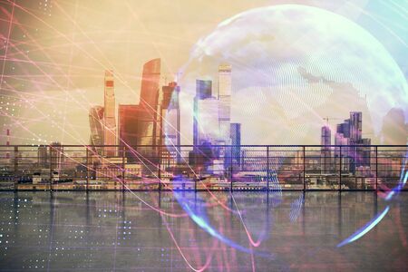 Map hologram with city view from roof background. Double exposure.の写真素材