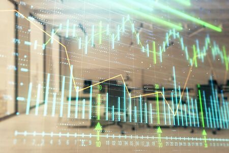 Stock and bond market graph with trading desk bank office interior on background. Multi exposure. Concept of financial analysisの写真素材
