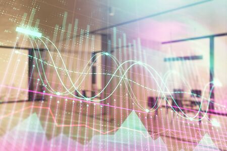 Stock and bond market graph with trading desk bank office interior on background. Multi exposure. Concept of financial analysisの写真素材