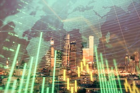 Double exposure of financial graph and world map on city veiw background. Concept of financial market research and analysisの写真素材