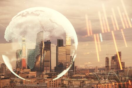 Double exposure of financial graph and world map on city veiw background. Concept of financial market research and analysisの写真素材